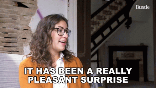 Woman With Glasses Saying Pleasant Surprise