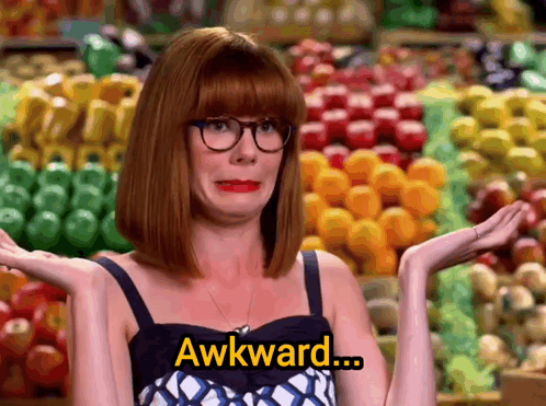 Woman With Glasses Says Awkward In Front of Fruits