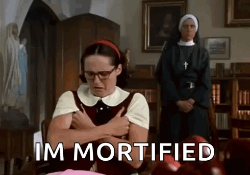 Woman With Glasses Sitting With Two Nuns GIF