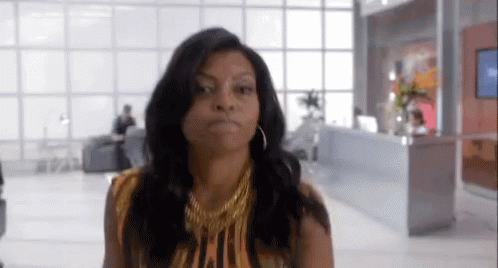 Woman With Gold Necklace And Earrings Funny Face GIF