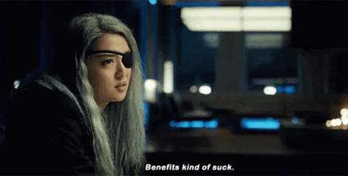 Woman With Gray Hair And Eye Patch Talking GIF