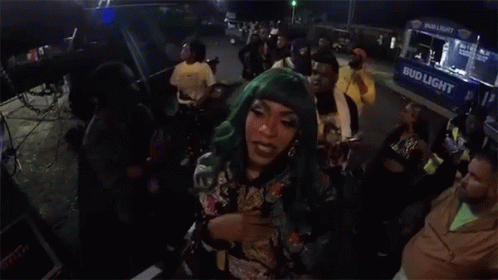 Woman With Green Hair In Front Of Food Truck GIF