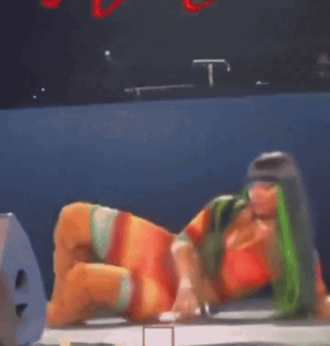 Woman with Green Hair Lying on Floor