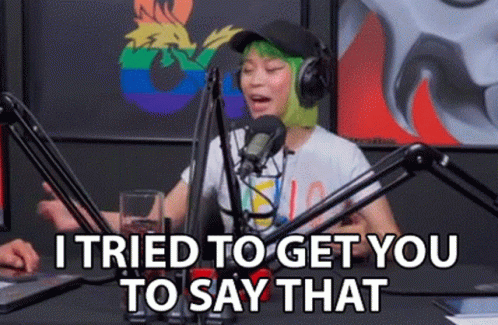 Woman with Green Hair Talking Into Microphone