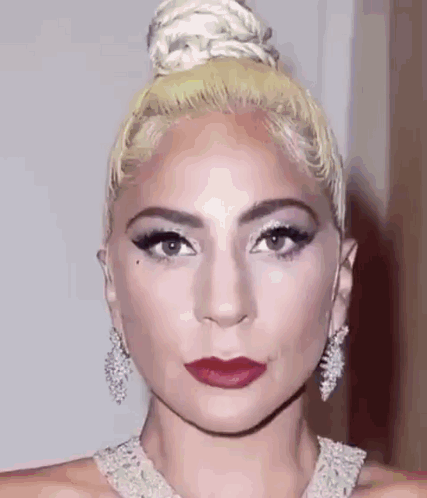 Woman With Hair Bun and Red Lipstick