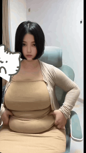 Woman with Hands on Hips and Hello Kitty Sticker