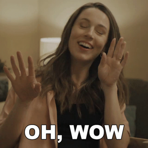 Woman With Hands Up Saying Oh Wow GIF