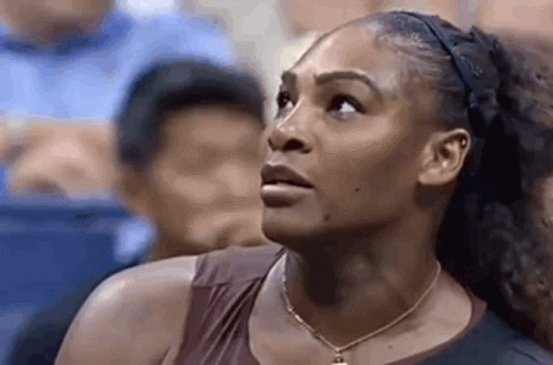 Woman With Headband Looking Up GIF