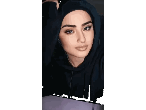 Woman With Headphones And Black Hoodie