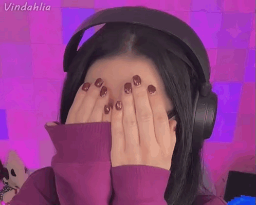 Woman With Headphones Covering Face