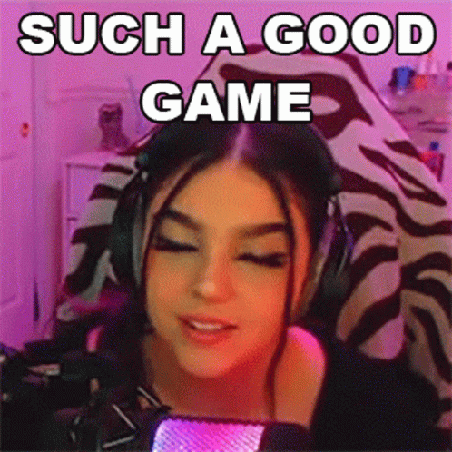 Woman With Headphones in Front of a Microphone Saying Such a Good Game