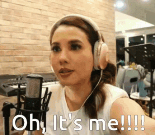 Woman With Headphones Microphone Saying Oh It's Me