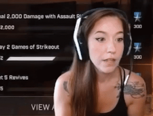 Woman With Headphones Playing Video Game GIF