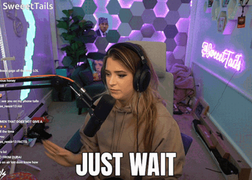 Woman With Headphones Saying Just Wait