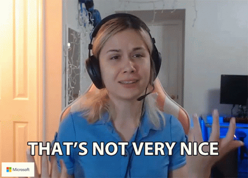 Woman With Headphones Says That's Not Very Nice Microsoft Logo