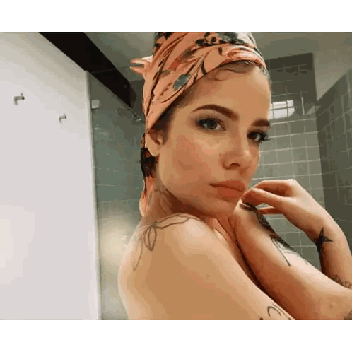 Woman with Headscarf Taking Selfie