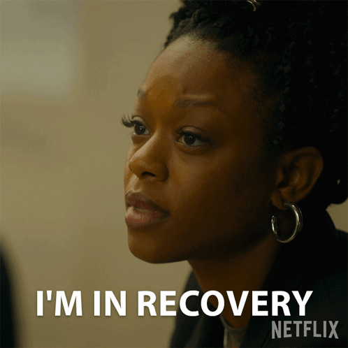 Woman With Hoop Earrings Says I'm In Recovery GIF