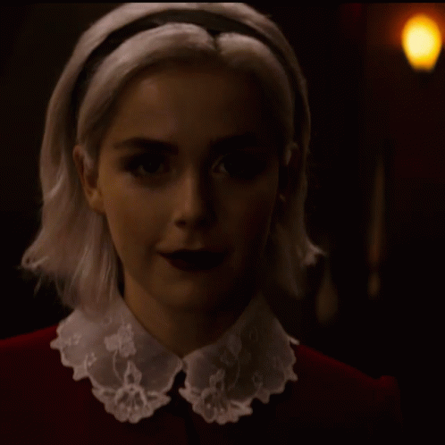 Woman With Lace Collar and Headband