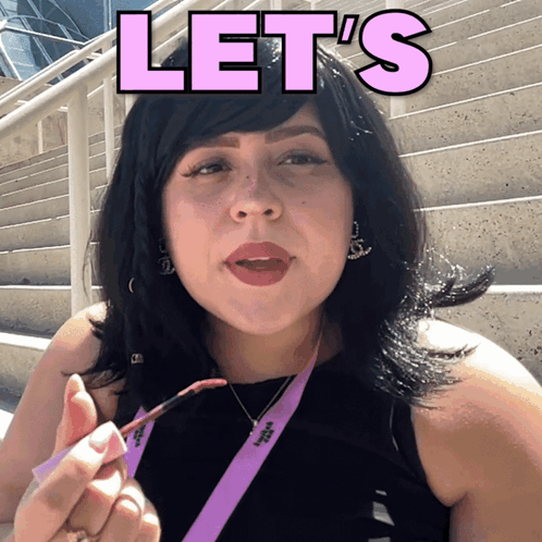 Woman With Lanyard Saying Let's
