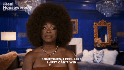 Woman With Large Afro Saying I Can't Win