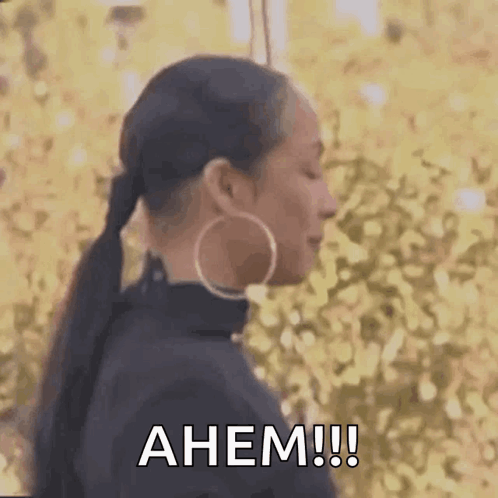Woman With Large Hoop Earrings Ahem GIF