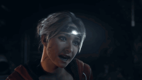 Woman With Light On Head Looking GIF