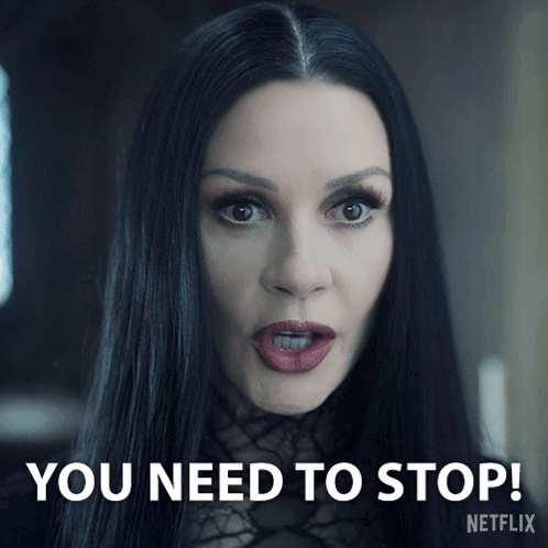 Woman With Long Black Hair And Red Lips Says You Need To Stop Netflix GIF