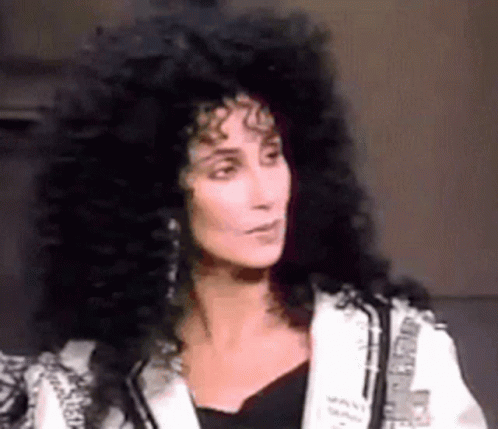 Woman With Long Black Hair and White Jacket