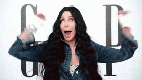 Woman with Long Black Hair Dancing in Denim Jacket