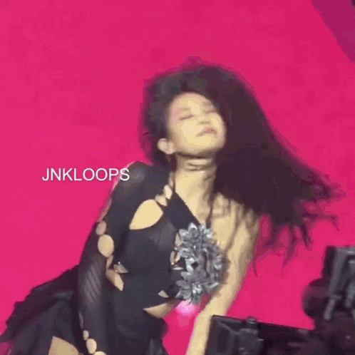Woman With Long Black Hair Holding Microphone GIF