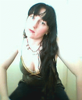 Woman With Long Black Hair In Plunging Top GIF