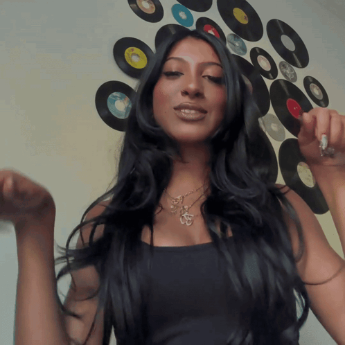 Woman with Long Black Hair in Record Wall