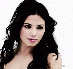 Woman With Long Black Hair in White Tank Top