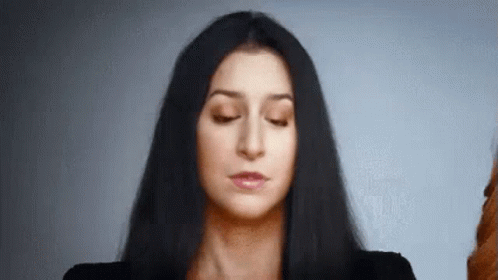Woman With Long Black Hair Making Funny Face