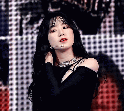 Woman With Long Black Hair Wearing Necklace