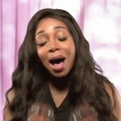 Woman With Long Black Hair Yawning GIF