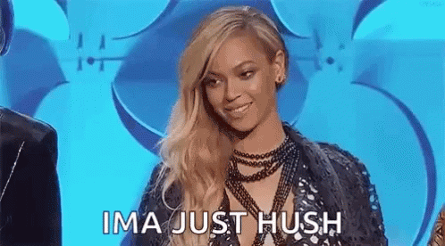 Woman With Long Blonde Hair Against Blue Background GIF