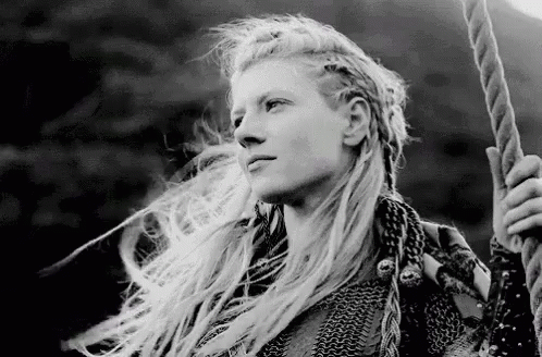 Woman With Long Blonde Hair Holding Rope GIF