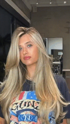 Woman With Long Blonde Hair In Guns N' Roses T-Shirt GIF