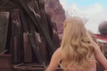 Woman With Long Blonde Hair Standing GIF
