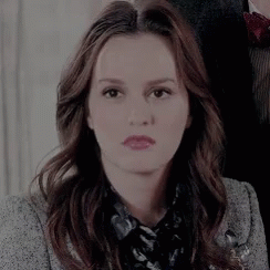 Woman With Long Brown Hair and Grey Jacket