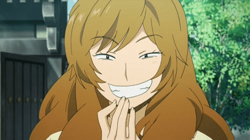 Woman With Long Brown Hair Smiling Hands Folded
