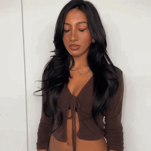 Woman with Long Dark Hair in Brown Crop Top