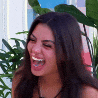 Woman with Long Dark Hair Laughing Open-Mouthed
