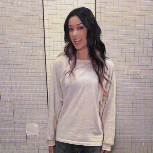 Woman with Long Dark Hair Wearing White Shirt and Scarf