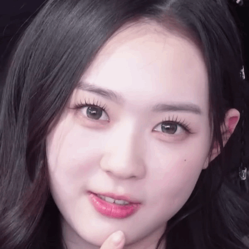 Woman With Long Eyelashes And Pink Lips GIF