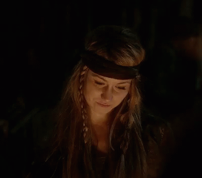 Woman with Long Hair and Feathers