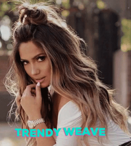 Woman with Long Hair and Watch Saying Trendy Weave