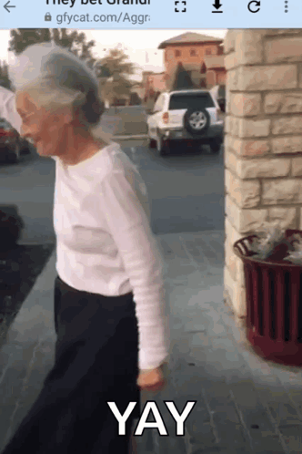 Woman With Long Hair Holding Cane With Purple Flames GIF