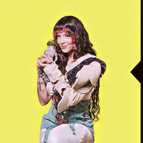 Woman with Long Hair Holding Parrot